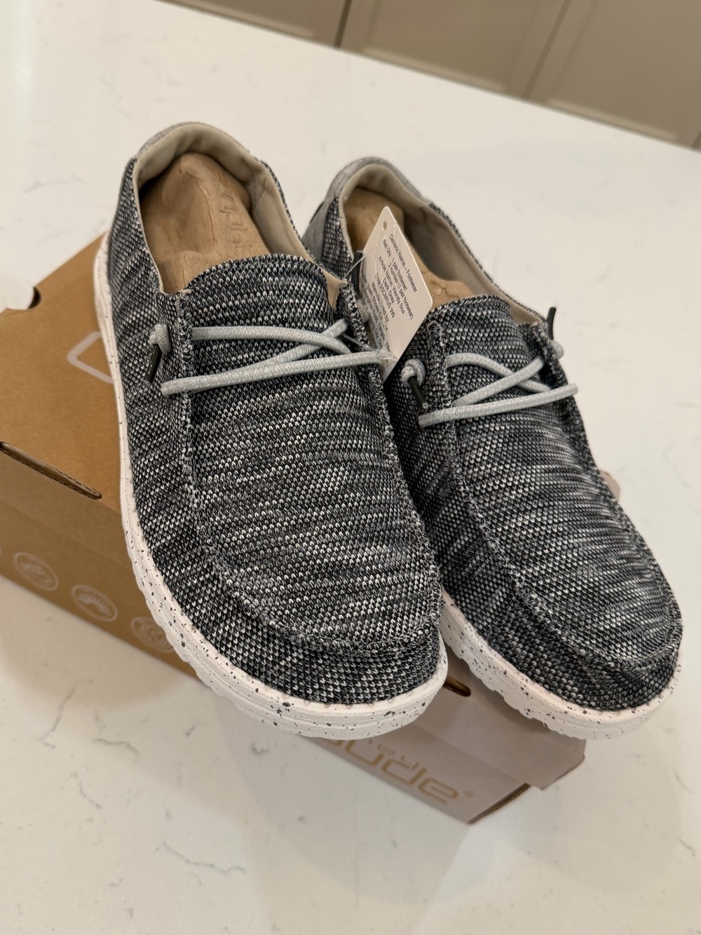 Hey Dude Wally Knit Slip-Ons in Black and White- size 9/40